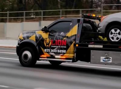 LION TRANSPORT & TOWING