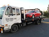 Star tow truck and junk cars020