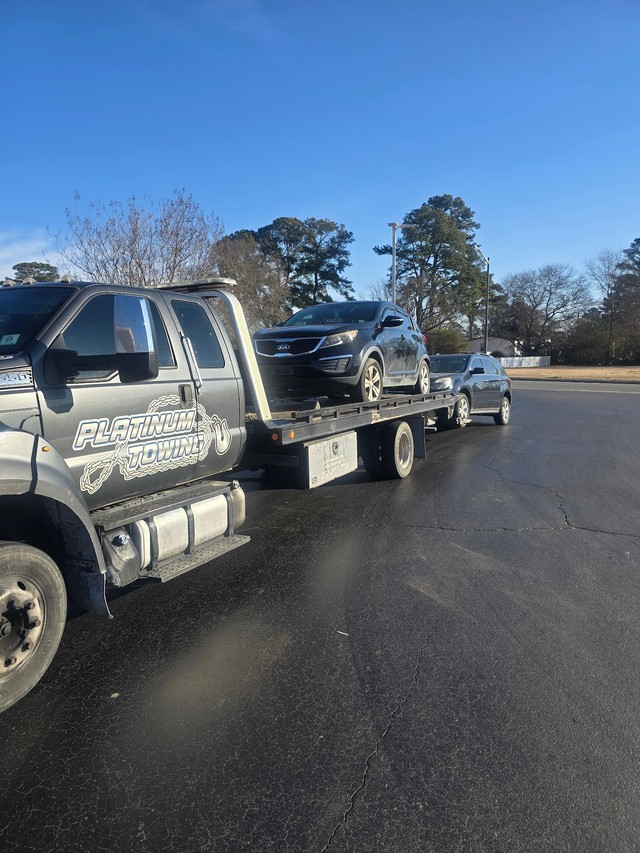 Johnny's Automotive & Diesel Repair and Platinum Towing