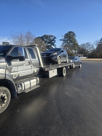 Johnny's Automotive & Diesel Repair and Platinum Towing