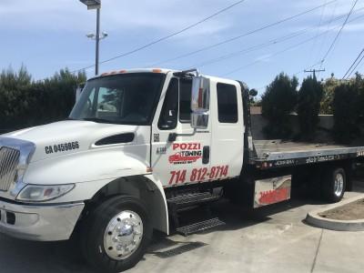 Pozzi Towing Inc