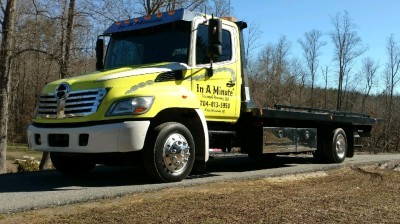 In A Minute Towing & Recovery, LLC