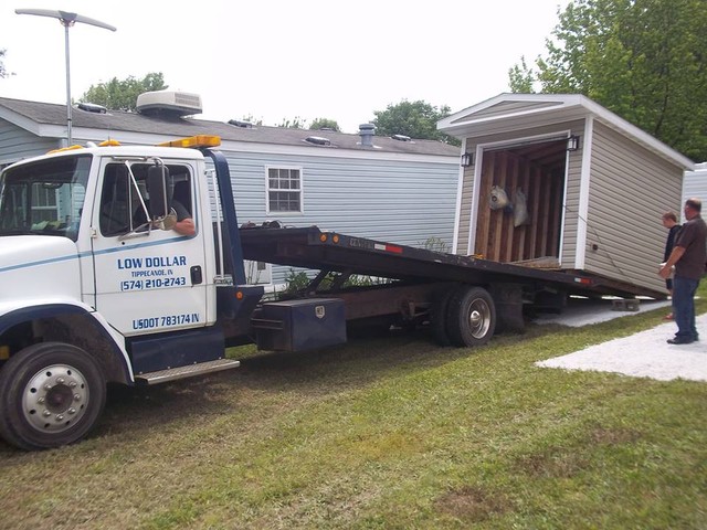 Low Dollar Companies L.L.C. / Towing Road Service